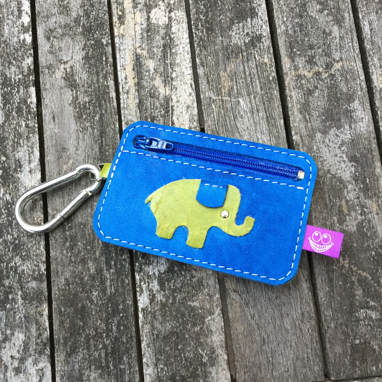 Little blue and green wallet with elephant back